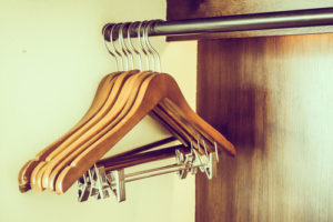 Empty clothes hanger in closet